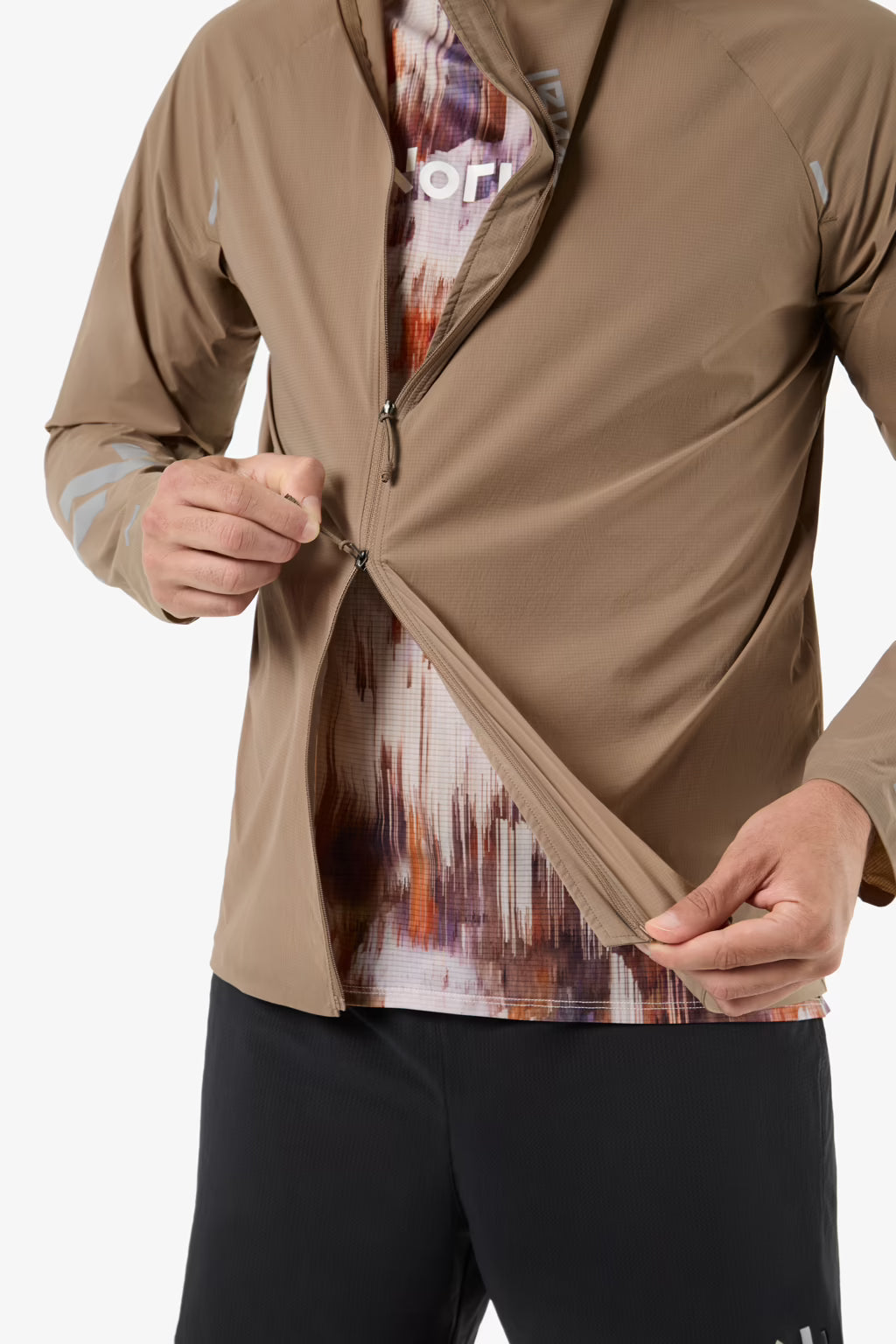 NNORMAL TRAIL WIND JACKET BROWN HOMBRE