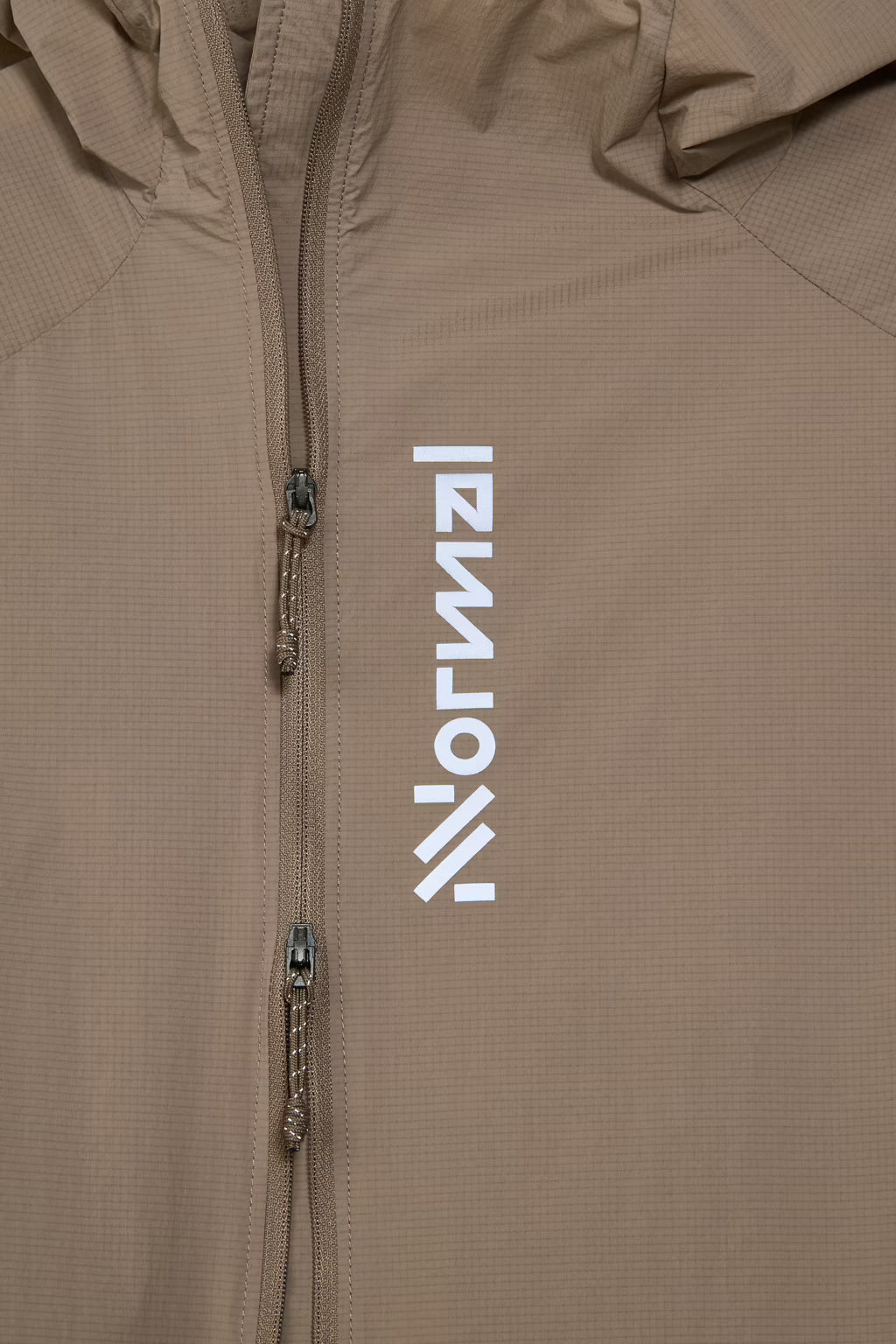NNORMAL TRAIL WIND JACKET BROWN MUJER